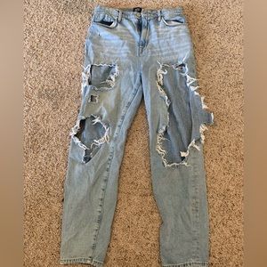 High waisted wide legged ripped jeans